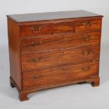 A George III mahogany chest, the rectangular top with a moulded edge above three small cockbeaded