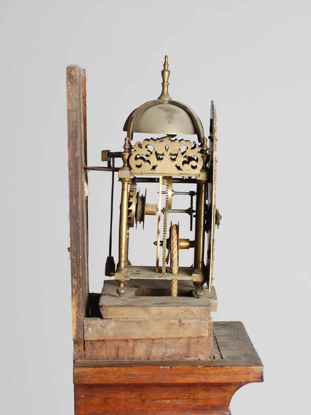 An 18th century lantern clock in an oak longcase, John Dison, St. Ives, the 5" brass dial with a - Image 4 of 5