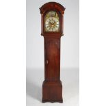 An 18th century oak automata longcase clock, I.P., the brass dial with silvered chapter ring bearing