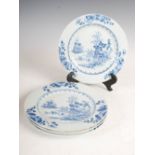 A set of four Chinese blue and white porcelain plates, Qing Dynasty, decorated with pavilions,