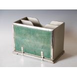 An unusual silver mounted shagreen magazine rack formed from the cover of an Arts & Crafts desk