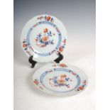 A pair of Chinese porcelain Imari plates, Qing Dynasty, decorated with a ribbon tied spray of