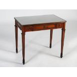 A late 19th century mahogany, parquetry inlaid and gilt metal mounted writing table, the rounded