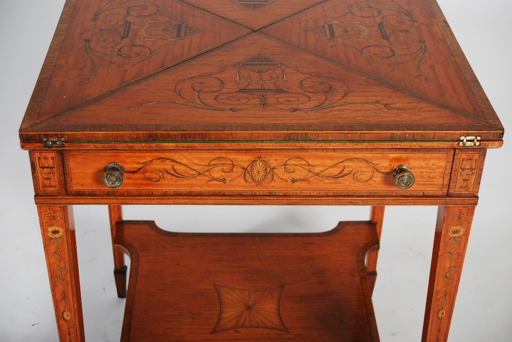 An Edwardian satinwood and marquetry inlaid envelope card table, the square top with four hinged - Image 3 of 7