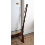 An early 19th century percussion cap musket, the 30¼ tapered round barrel with three ram rod