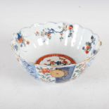 A Japanese Imari bowl, Meiji period, of lobbed form, the interior decorated with a circular panel