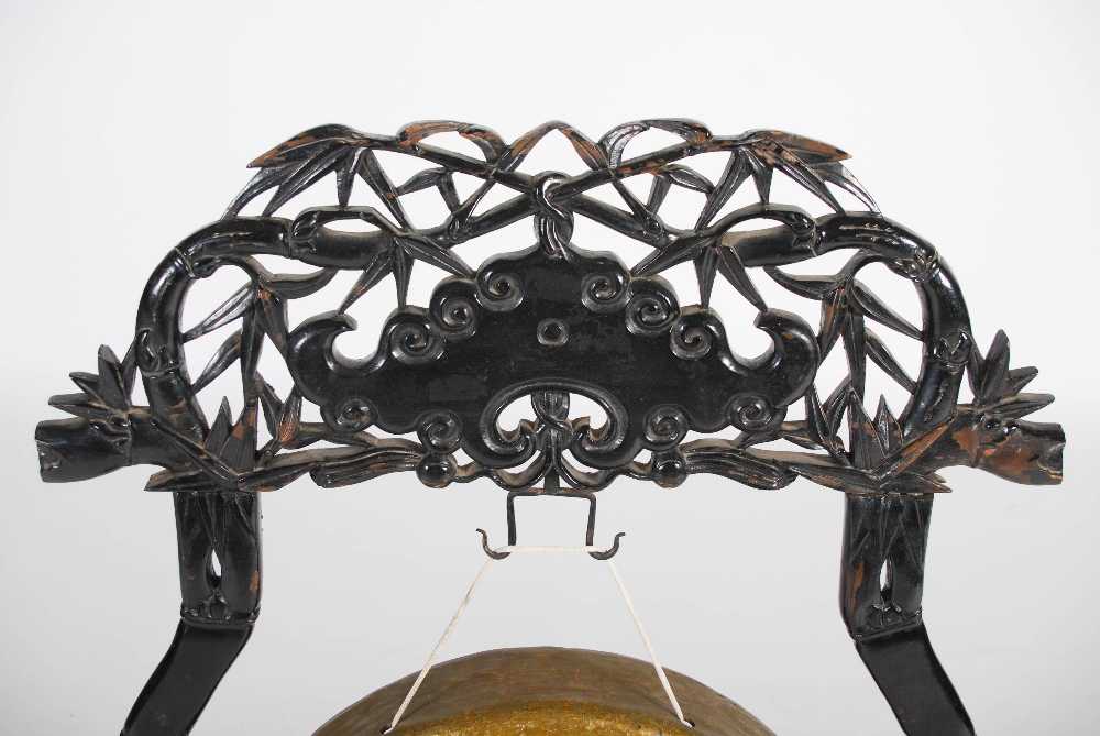 A Chinese gong and stand, late Qing Dynasty, the stand carved and pierced with bamboo stems - Image 2 of 6