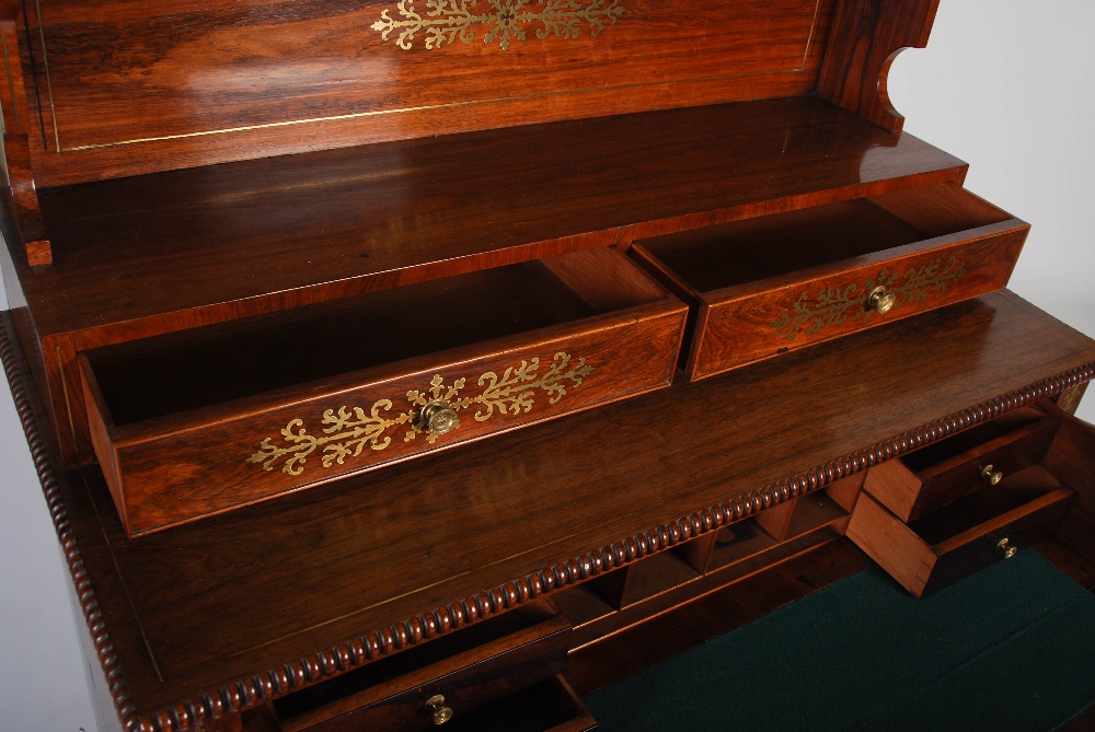 A 19th century Regency style rosewood and brass inlaid secretaire chiffonier, the upper section with - Image 3 of 7