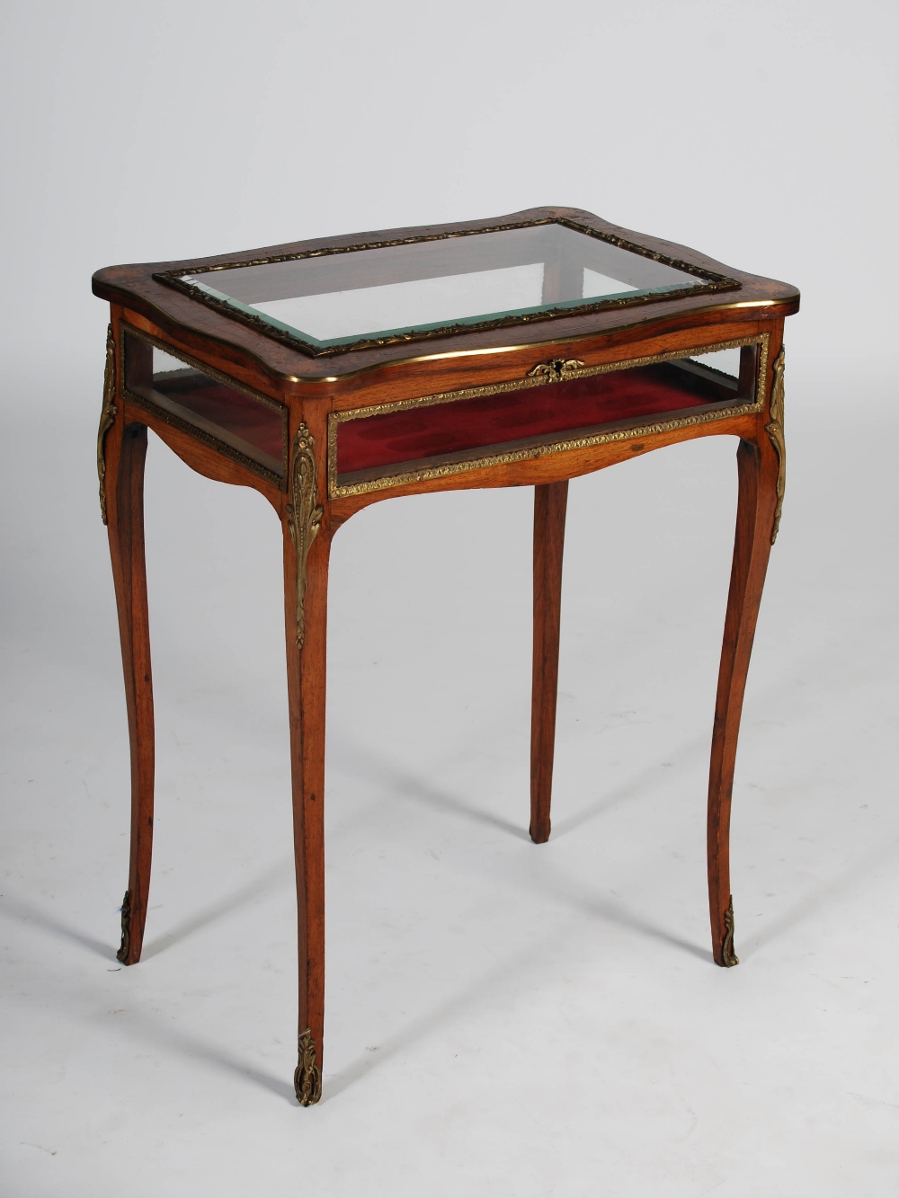 A late Victorian rosewood, marquetry inlaid and gilt metal mounted bijouterie table, the hinged