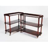 A pair of Victorian style mahogany three tier whatnots, the rectangular tiers with reeded edges,