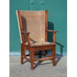 A late 19th/ early 20th century stained pine Orkney chair, with drop in seat, 84cm high.