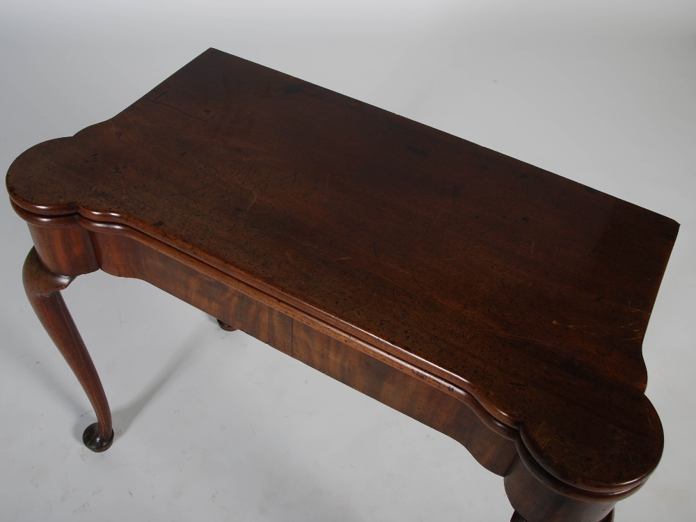 A George III mahogany concertina action card table, the shaped rectangular top opening to a green - Image 4 of 5