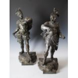 A large pair of decorative early 20th century bronzed spelter knights, 75cm high.