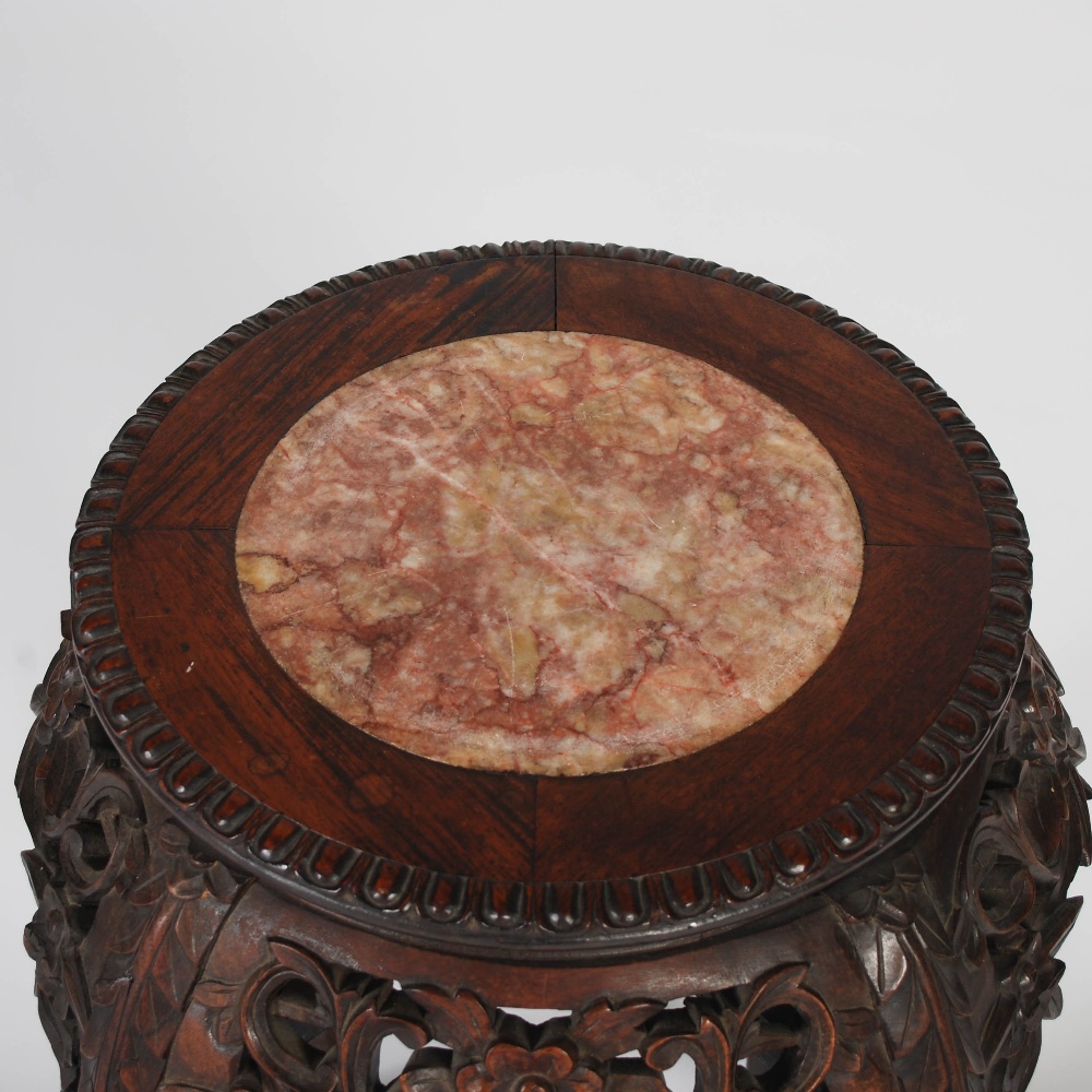 A Chinese dark wood jardiniere stand, late Qing Dynasty, the circular top with a mottled red - Image 3 of 3