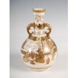 A Japanese Satsuma bottle vase, Meiji period, decorated with panels of bijin and children within