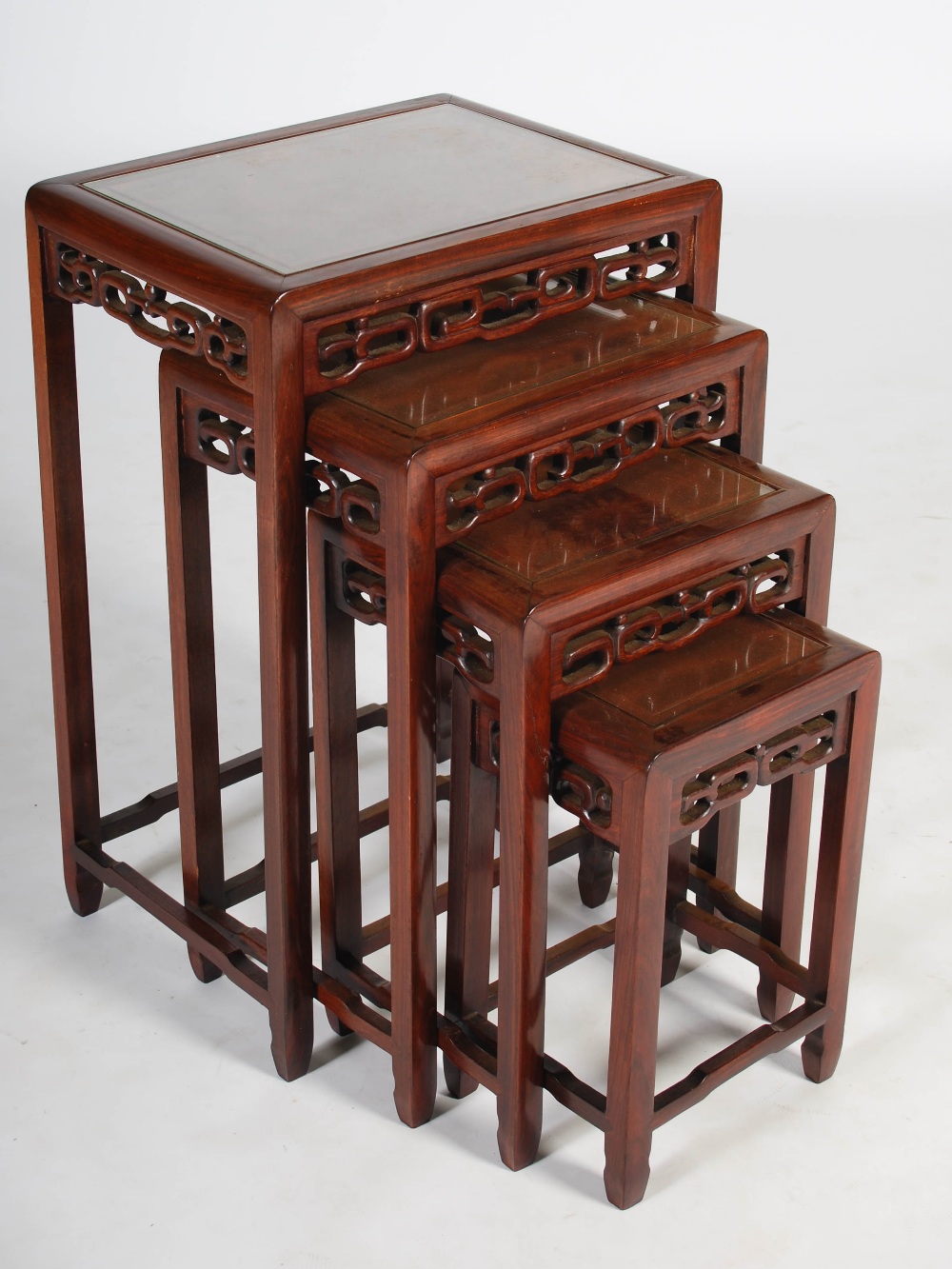 A quartetto of four Chinese dark wood occasional tables, late Qing Dynasty, the rectangular tops - Image 2 of 3