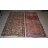 Two Kazak type rugs, the larger decorated with three rectangular medallions enclosing stylised plant