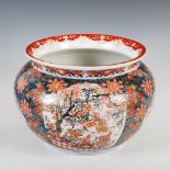 A late 19th/early 20th century Japanese Imari porcelain jardiniere, decorated with rectangular