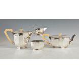 An Art Deco four piece silver and ivory tea set, London, 1934, makers mark of E.V, octagonal