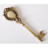 Golfing Interest- A George V silver gilt presentation key, Birmingham, 1911, makers mark of