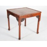 A Chinese dark wood gaming table, late 19th/early 20th century, the square panelled top above a
