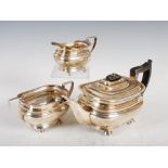 A George V silver three piece tea set, Sheffield, 1921, makers mark of R&B, comprising; teapot, twin