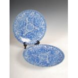 A Pair of Japanese blue and white porcelain chargers, early 20th century, printed with dragons and