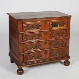 A Charles II oak chest, the rectangular planked top with a moulded edge above four long drawers,