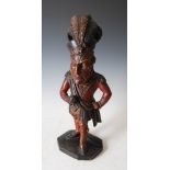 A late 18th century/early 19th century carved and painted pine tobacco advertising figure of a