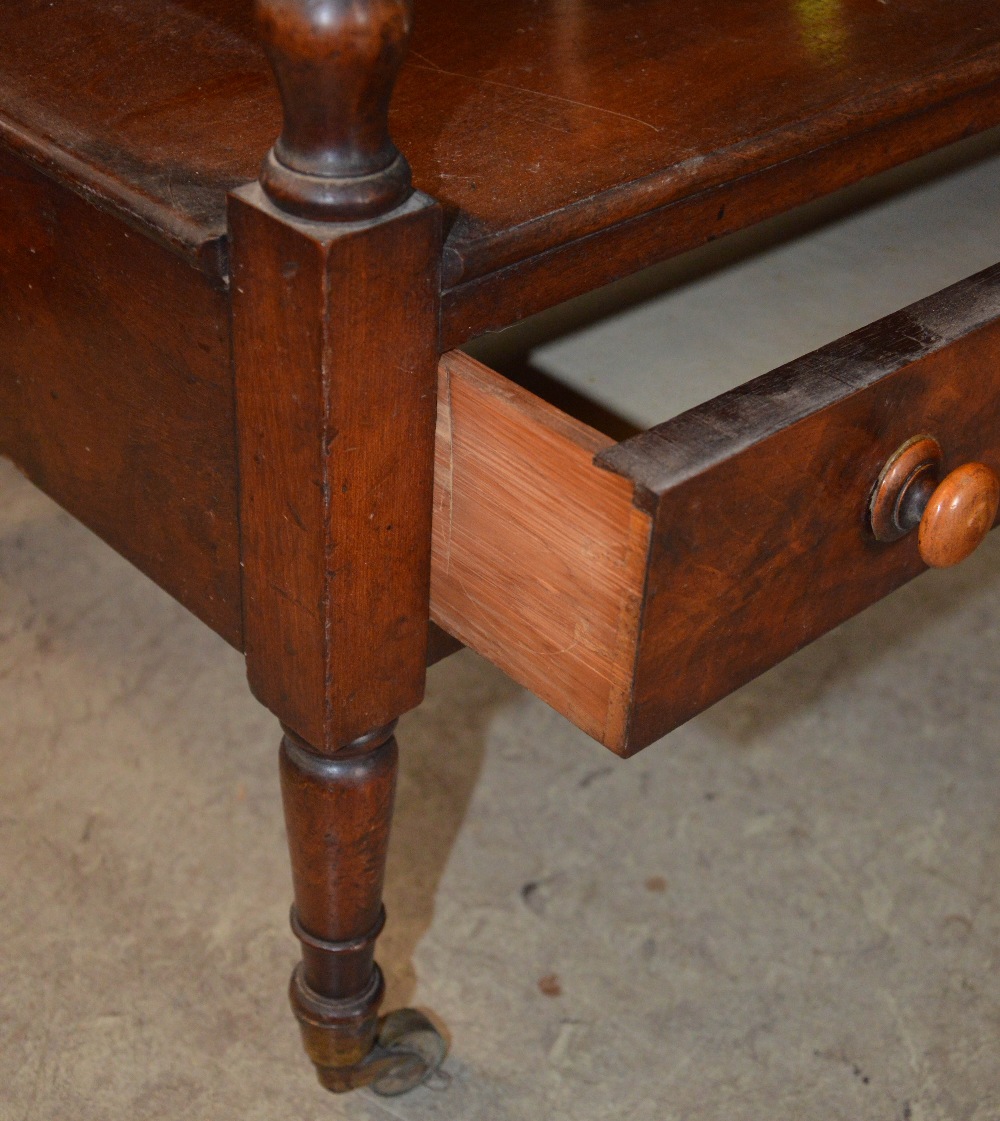 A 19th century mahogany four tier what-not, with single frieze drawer and tapered cylindrical - Image 2 of 2