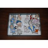 ELEVEN ASSORTED PORCELAIN HALF DOLL PIN CUSHION TOPS