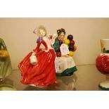 TWO ROYAL DOULTON FIGURES - AUTUMN BREEZES HN1934 AND THE OLD BALLOON SELLER HN1315