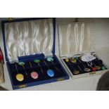 CASED SET OF SIX SHEFFIELD SILVER COFFEE SPOONS WITH COLOURED BEAN TERMINALS AND A CASED SET OF