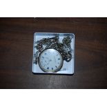 SILVER CASED ACME LEVER OPEN FACED POCKET WATCH, TOGETHER WITH TWO WHITE METAL ALBERT CHAINS