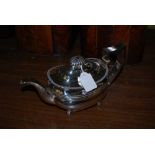 LONDON SILVER TEAPOT, OVAL SHAPED WITH REEDED DETAIL AND FOUR BALL FEET