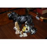 GOEBEL FIGURE OF A PUPPY CHEWING MANUAL 'TRAIN YOUR DOG', SMALL GOEBEL DOG AND ANOTHER SEATED DOG