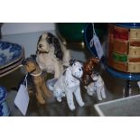 FOUR COLD PAINTED SPELTER DOG FIGURES