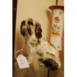 CONTINENTAL PORCELAIN FIGURE OF A BOLINESE SPANIEL, POSSIBLY MEISSEN