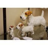 THREE ROYAL DOULTON TERRIER DOG GROUPS OF ASSORTED SIZE