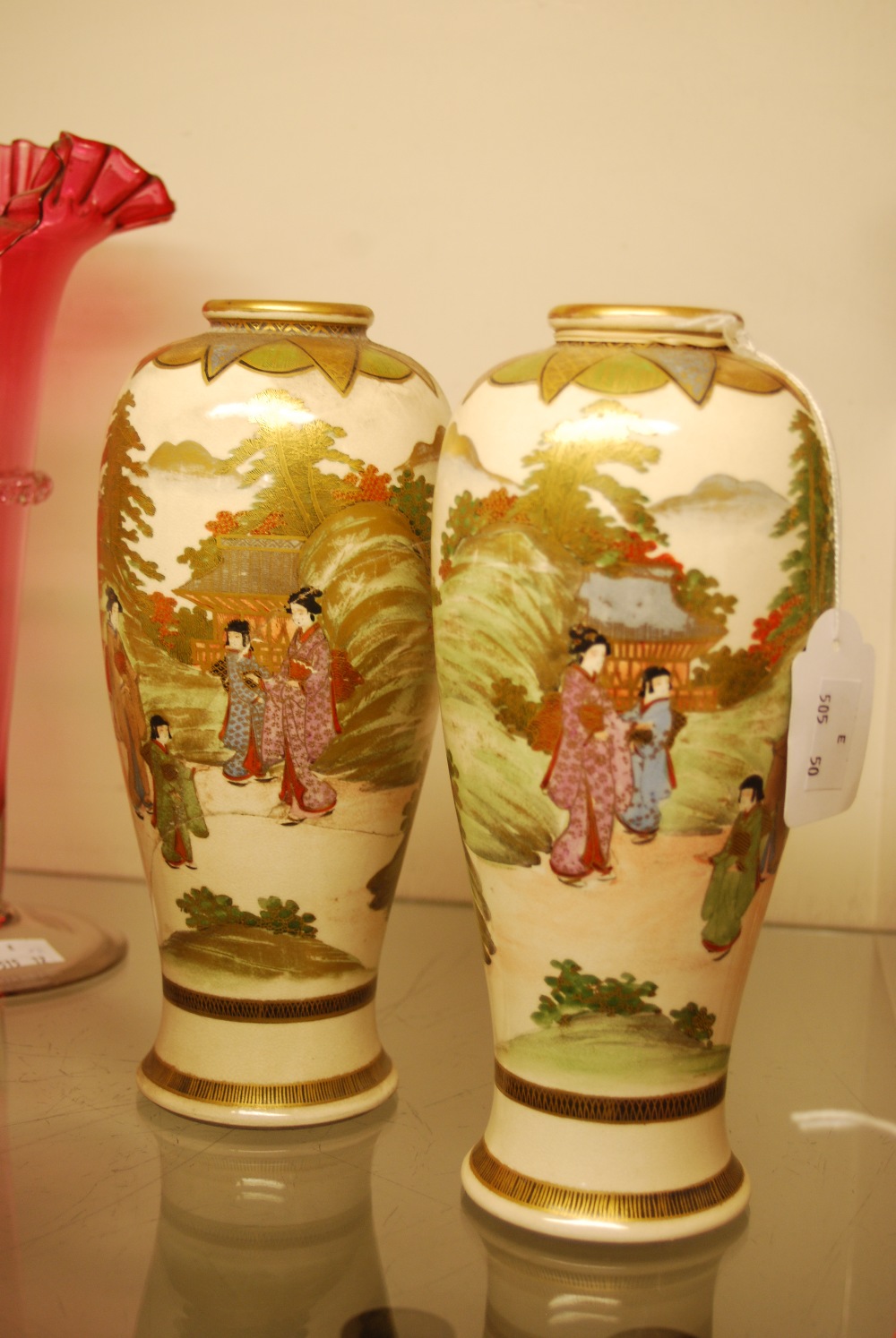 PAIR OF LATE 19TH CENTURY JAPANESE SATSUMA POTTERY VASES DECORATED WITH FIGURES