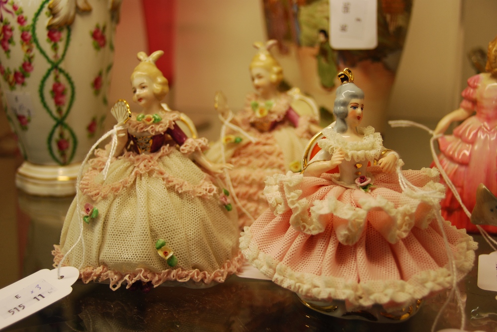 THREE CONTINENTAL PORCELAIN PIERCED CRINOLINE WORK LADIES