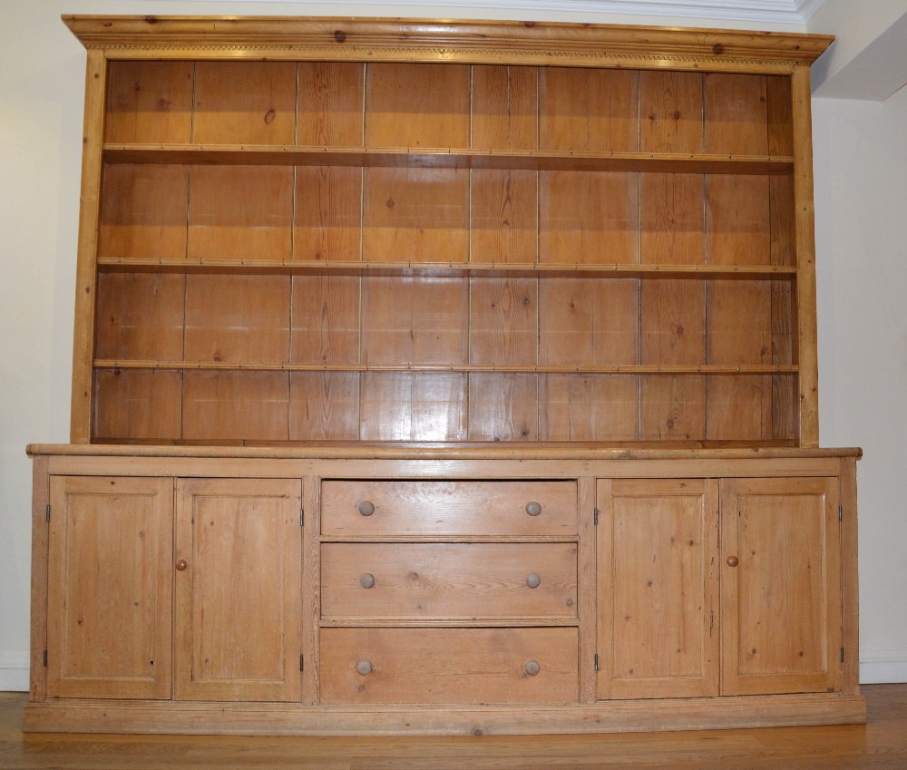 A late 19th/early 20th century pine country house kitchen dresser, the upper section with moulded - Image 2 of 5