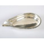 A Victorian silver pap boat, London, 1853, makers marks rubbed, oval shaped with beaded border,