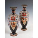 A pair of Japanese cloisonne vase, Meiji Period, decorated with leaf shaped panels enclosing dragons