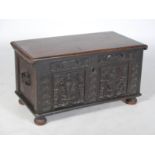 An antique oak chest dated 1671, inscribed CLAUS STUCK, the later hinged rectangular top opening