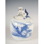 A Japanese porcelain Hirado jar and cover, Meiji Period, the jar decorated with pavilions, pine