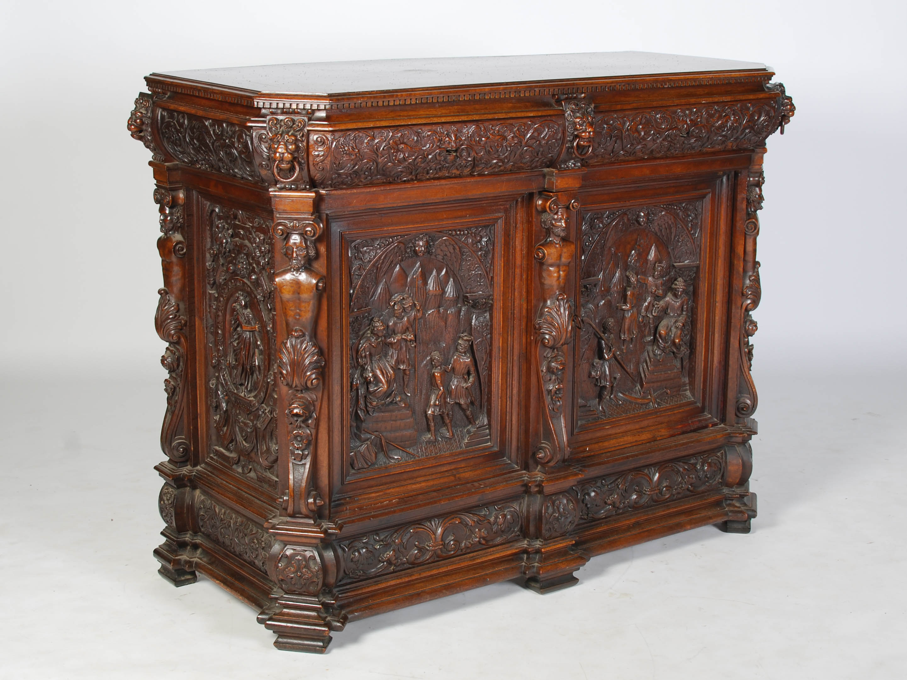 A 19th century Continental walnut Renaissance revival side cabinet, probably Italian, the