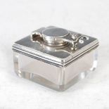 A George III silver mounted glass travelling inkwell, London, 1815, makers marks rubbed, the clear