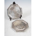 A rare pair of late 19th century Chinese silver octagonal shaped stands, Qing Dynasty, the soles