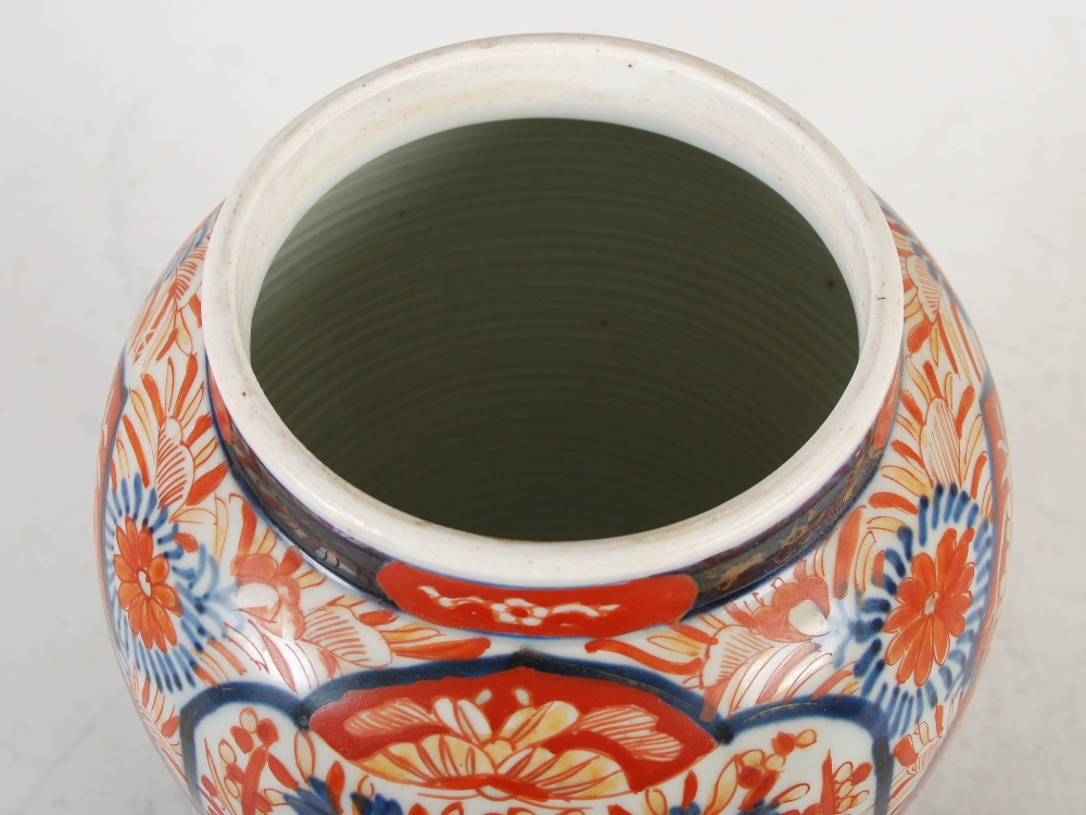 A pair of Japanese Imari porcelain jars and covers, Meiji Period, 39cm high - Image 11 of 15